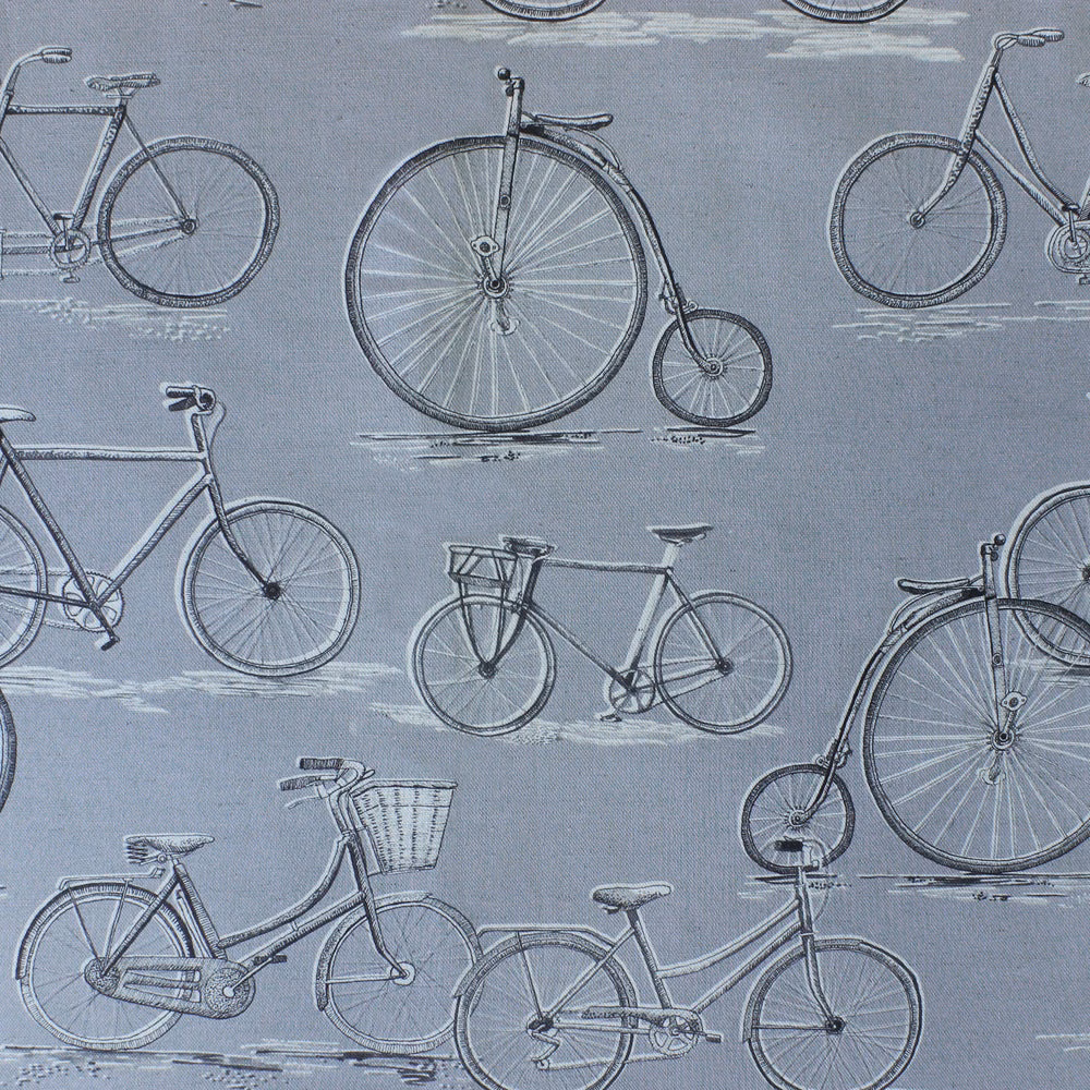 Grey fabric with repeating vintage bicycles and sketchy white ground marks