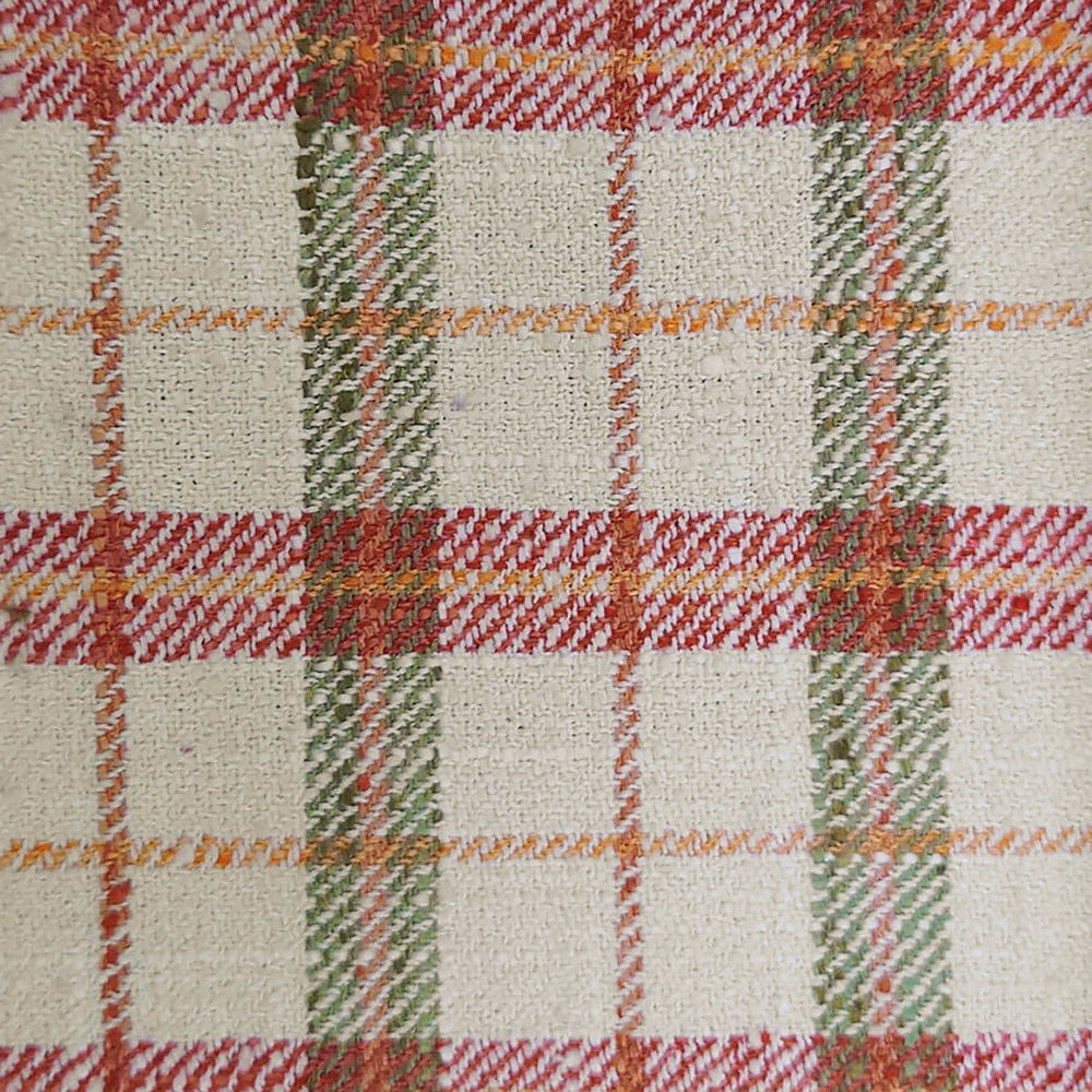Cream tartan fabric with red, green and orange woven checks