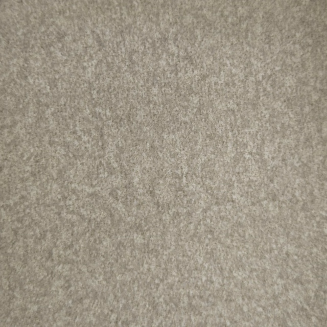 Soft warm cream textured fabric swatch with a brushed, mottled finish