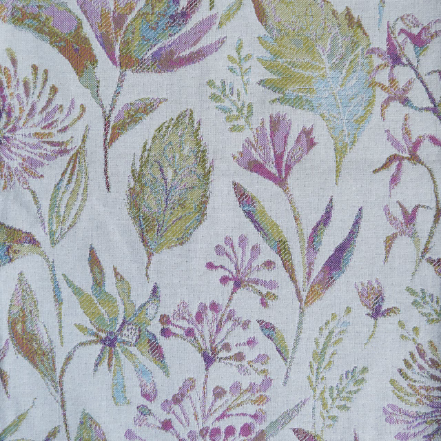 Botanical floral fabric with elder pink, lilac and sage leaves on a pale ground