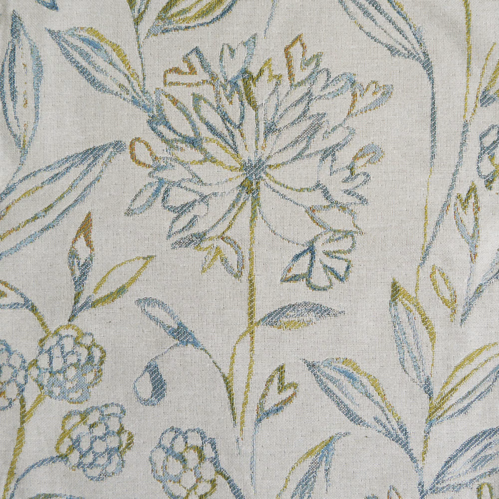 Pale woven floral fabric with soft blue and sage stems on an ivory ground