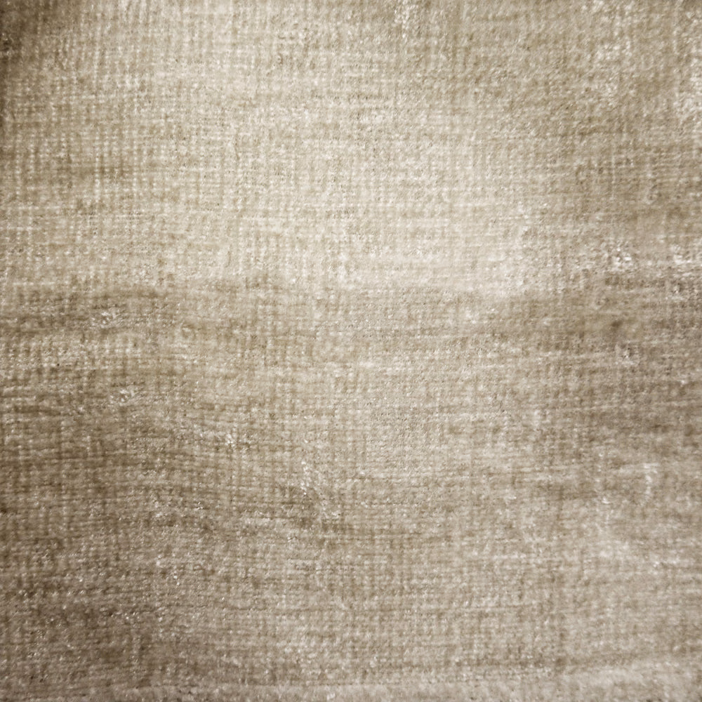 Close-up of warm sandy beige woven fabric with subtle tonal striations