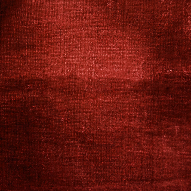 Deep wine-red woven fabric with a softly textured, slightly lustrous surface