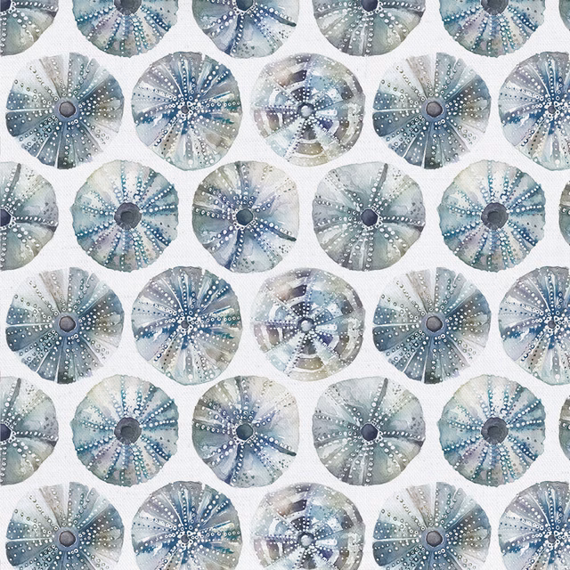 Printed circular seaurchin motifs in cool grey, seafoam and blue on a pale cotton ground