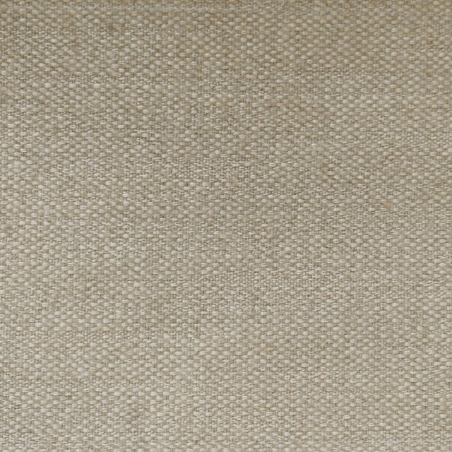 Close-up of a soft beige woven fabric with a natural textured slub finish