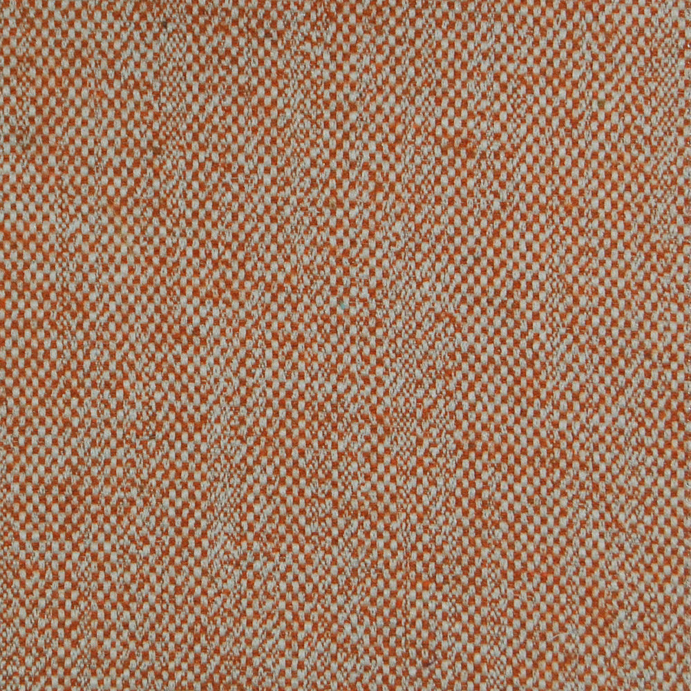 Close-up of a burnt orange and cream tiny woven check fabric