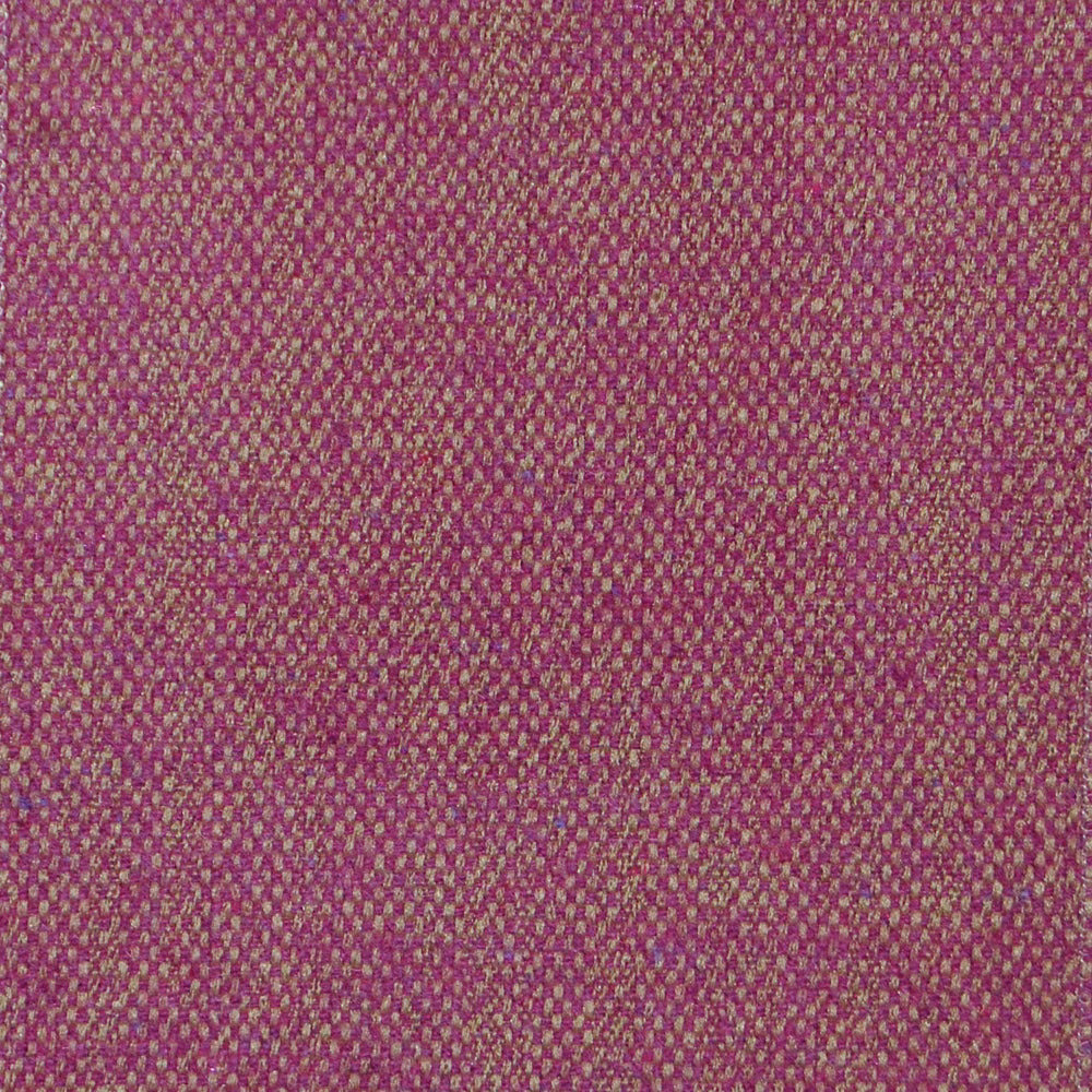 Close-up of a magenta pink woven fabric with fine textured flecks
