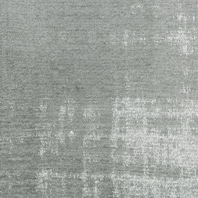 Close-up of cool grey textured fabric with a soft mottled sheen