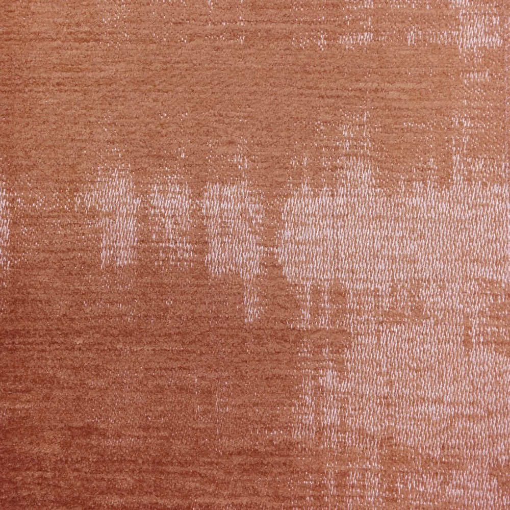Close-up of Stratos Orange woven fabric with a terracotta sheen and abstract texture