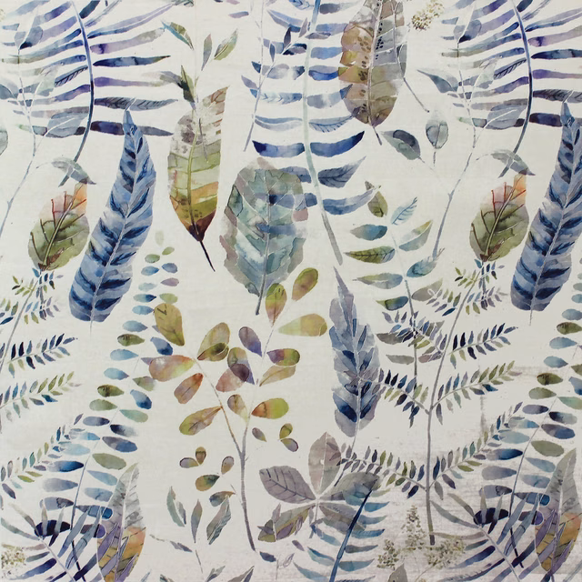 Painterly blue and green botanical leaf fabric on a pale ground
