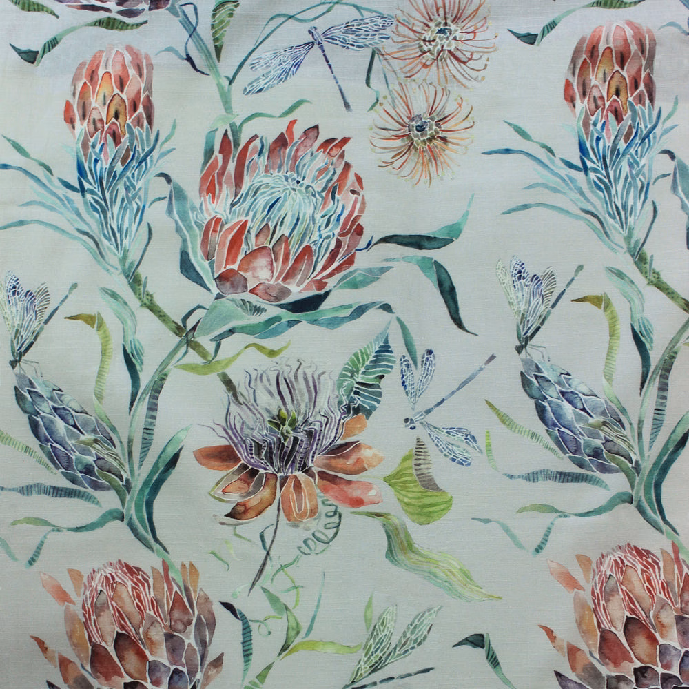 Painterly floral fabric with large botanical motifs on a soft grey ground