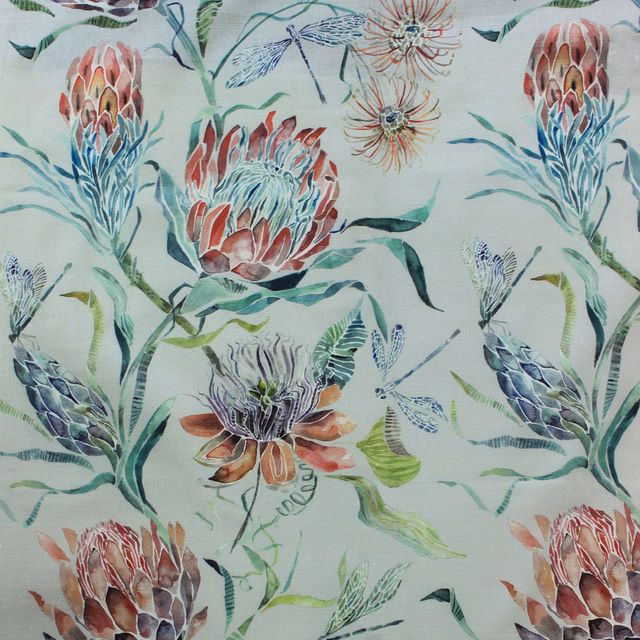 Painterly floral fabric with large botanical motifs on a soft grey ground