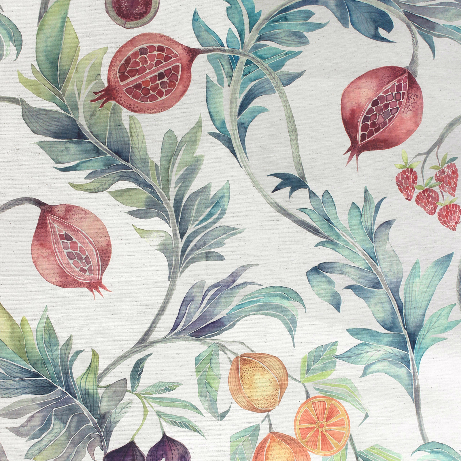 Painterly botanical fabric with teal leaves and coral pomegranate motifs on an ivory ground