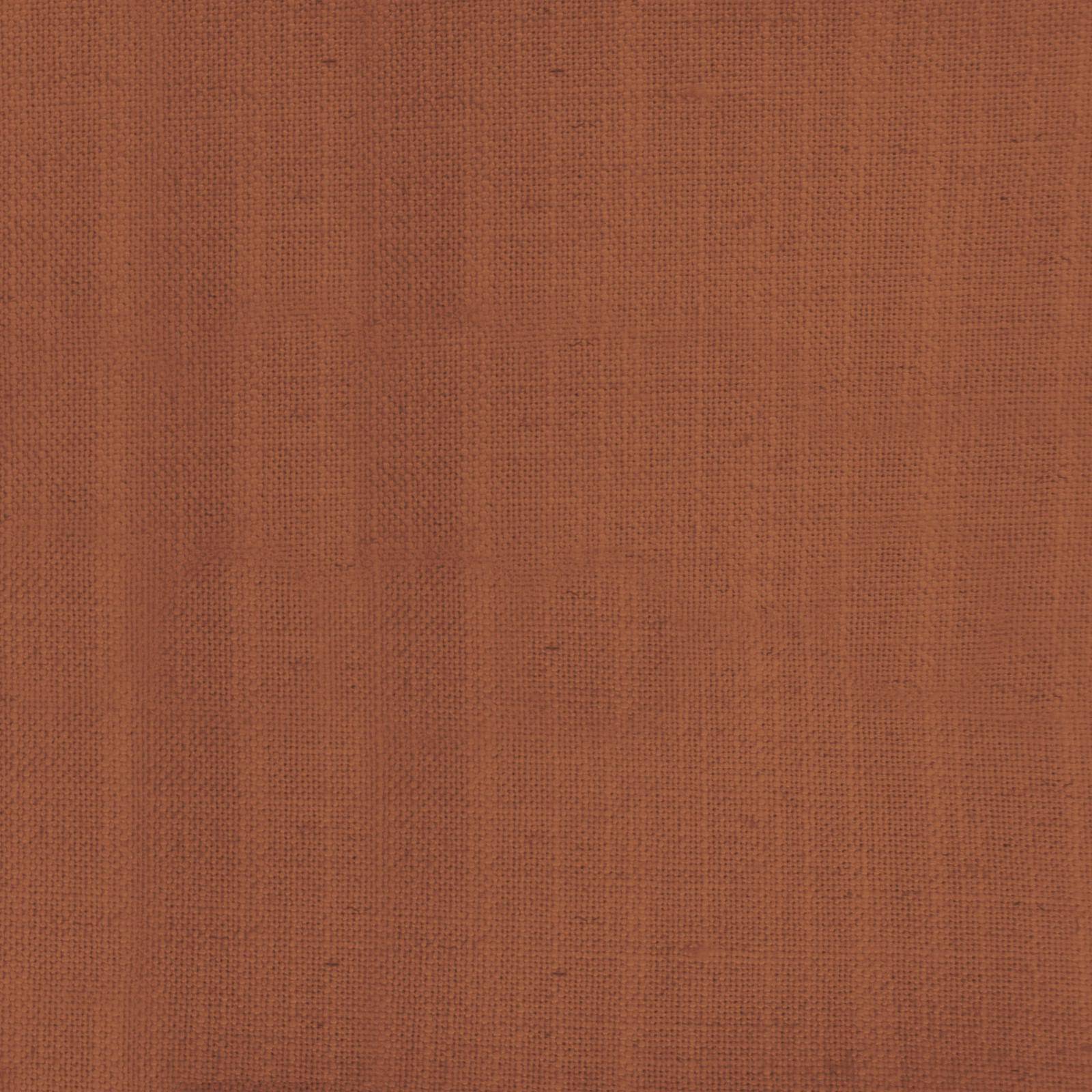 Warm terracotta-orange plain woven fabric with a dry, textured linen look