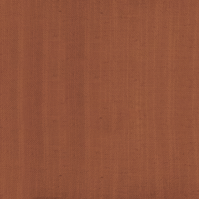 Warm terracotta-orange plain woven fabric with a dry, textured linen look