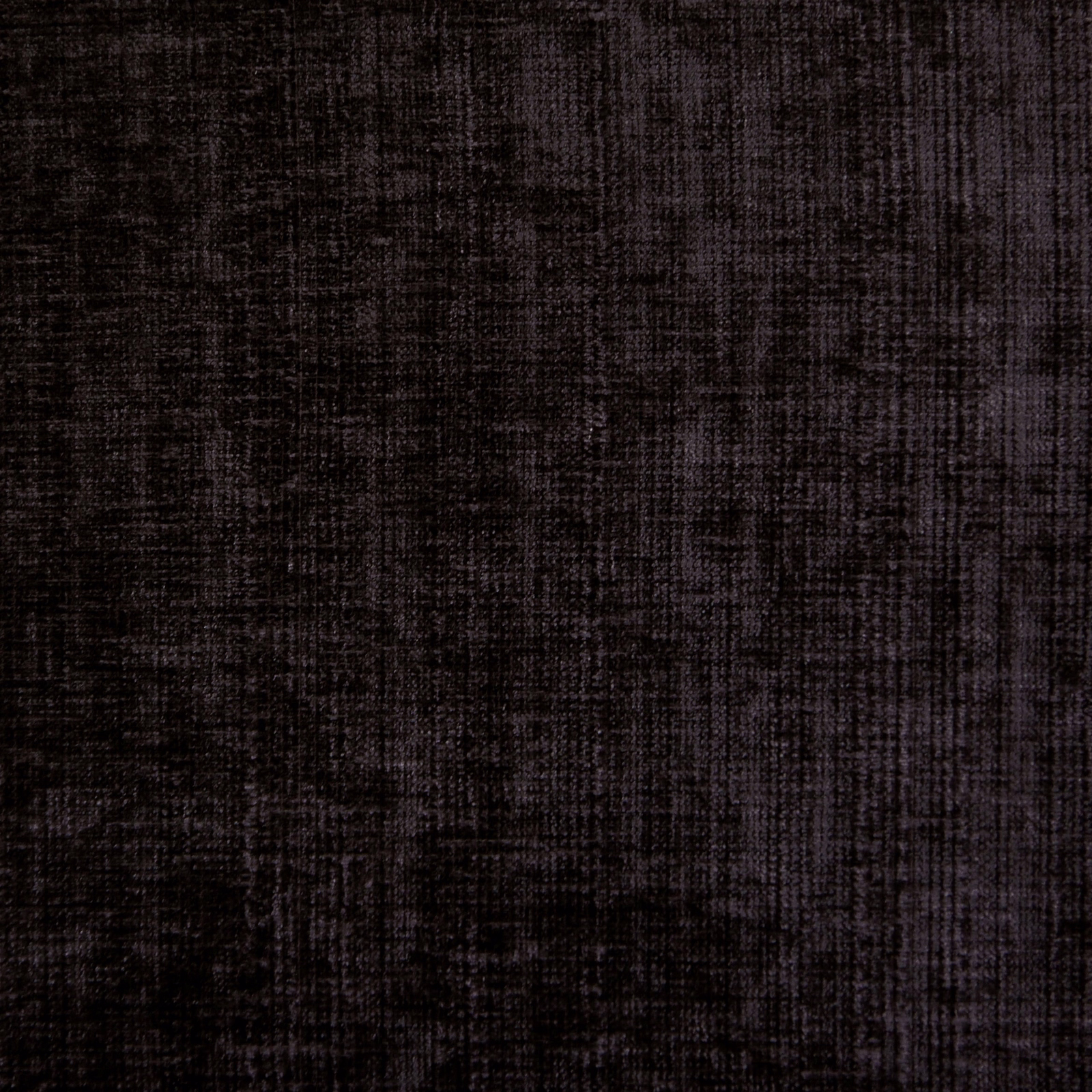 Dark charcoal-black textured woven fabric with subtle cross-hatched flecks