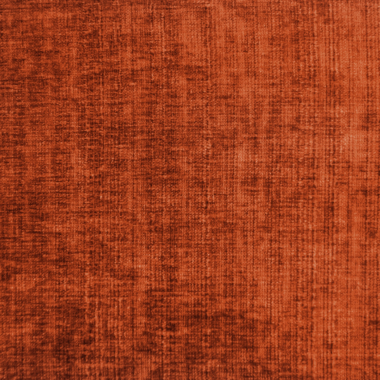 Burnt copper orange textured fabric swatch with a subtle woven grain