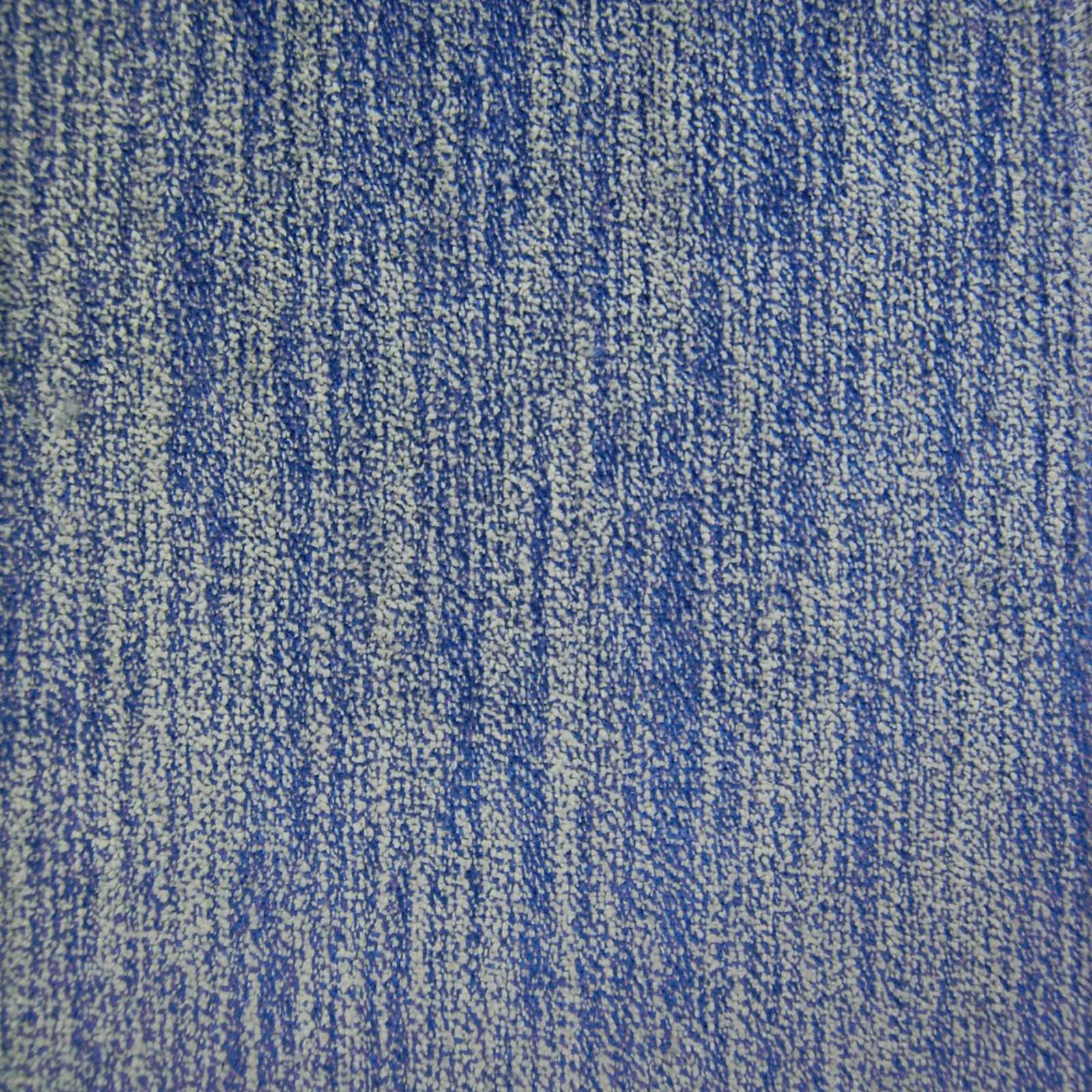 Close-up of mottled cobalt blue woven fabric with textured vertical striations