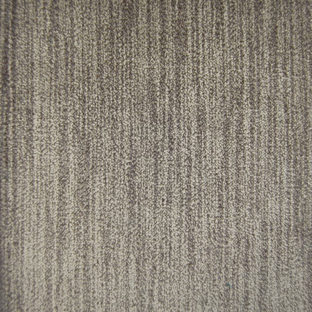 Close-up of muted brown woven fabric with fine speckled vertical striations