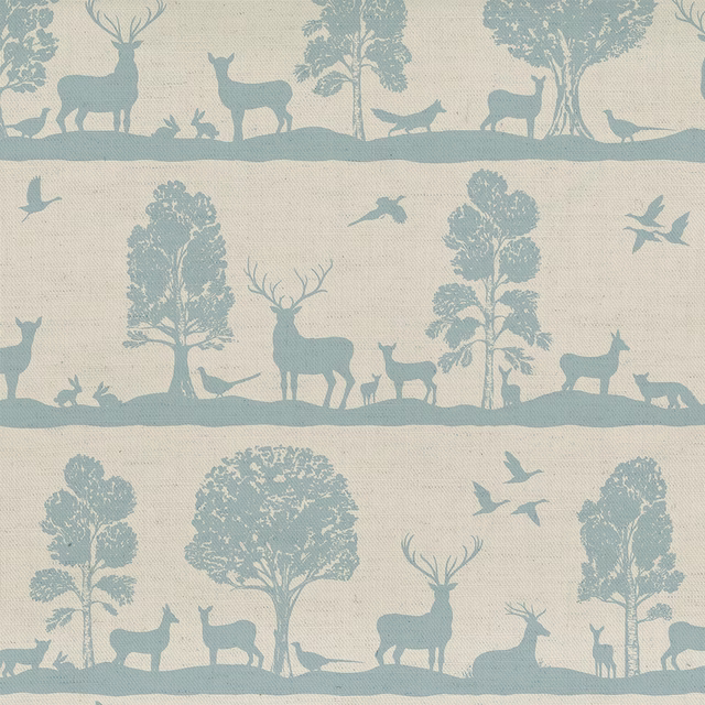 Powder blue deer and tree woodland print on a pale natural linen-cotton ground