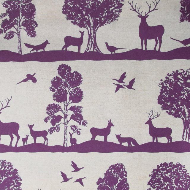 Plum purple deer and tree woodland print on a pale linen-cotton ground