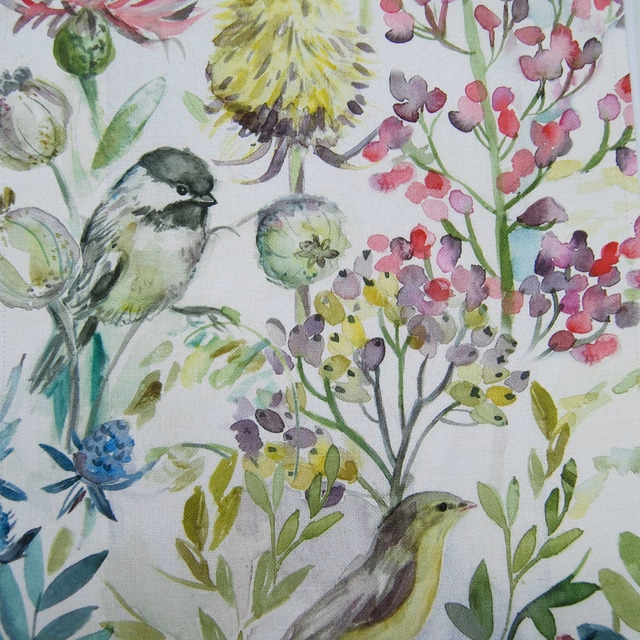 Watercolour bird and blossom print on a pale ground with soft green and pink accents