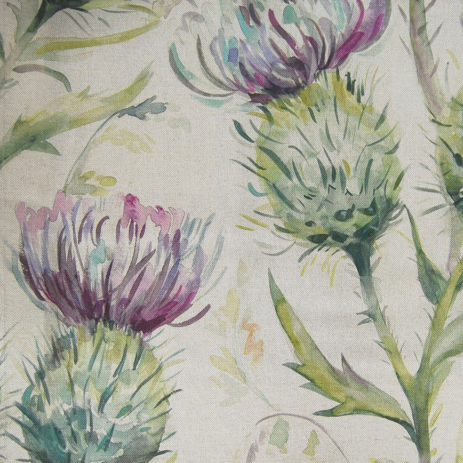 Painterly thistle print fabric in soft sage, lilac and moss green tones
