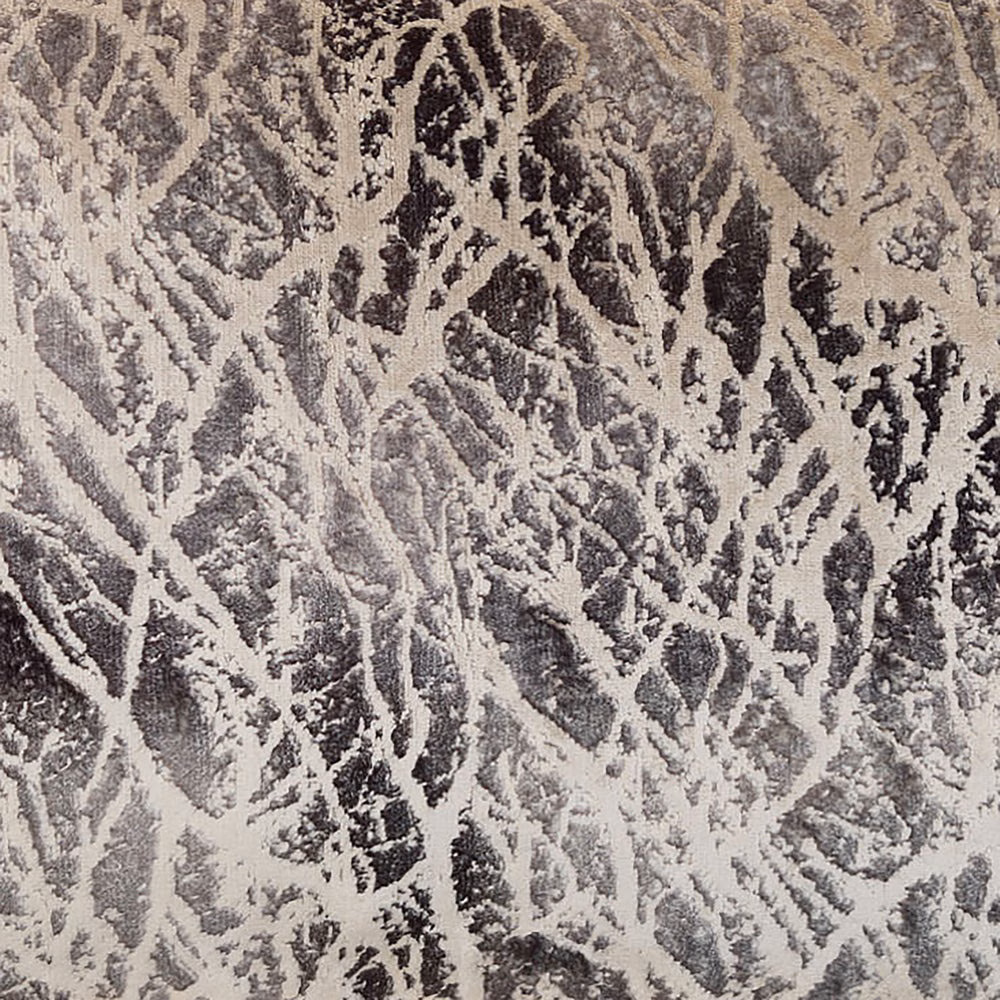 Close-up of a grey abstract jacquard with pale and charcoal branch-like pattern