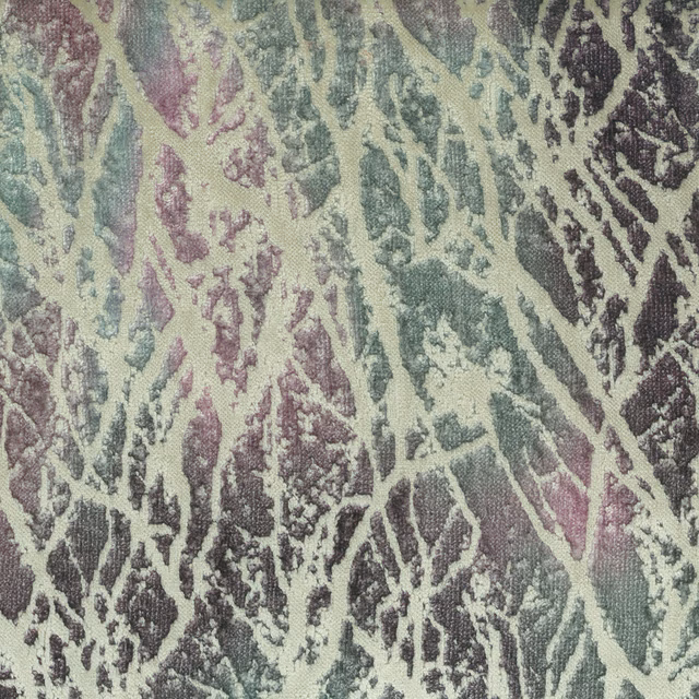 Abstract purple, sage and plum leaf-like pattern on a pale woven fabric swatch