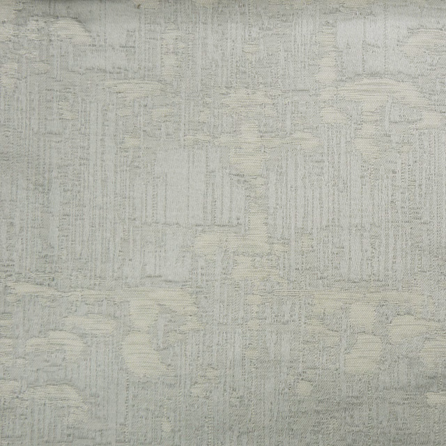 Soft cream textured woven fabric with subtle grid-like pattern and raised surface