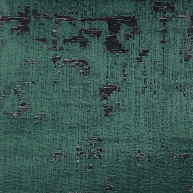 Teal green textured fabric swatch with dark abstract painterly markings