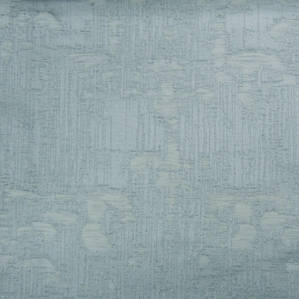 Pale cool grey textured woven fabric with a softly mottled, raised pattern