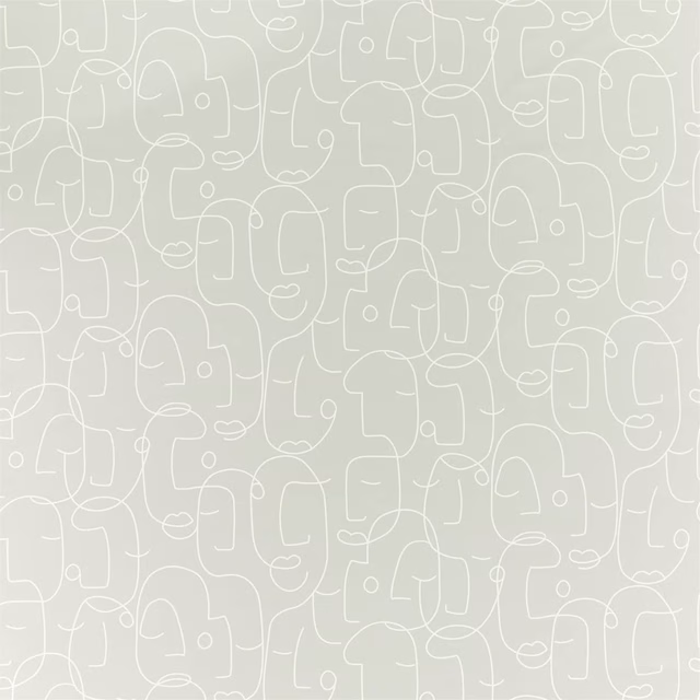 Pale sage-grey fabric with ivory abstract faces and looping line motifs