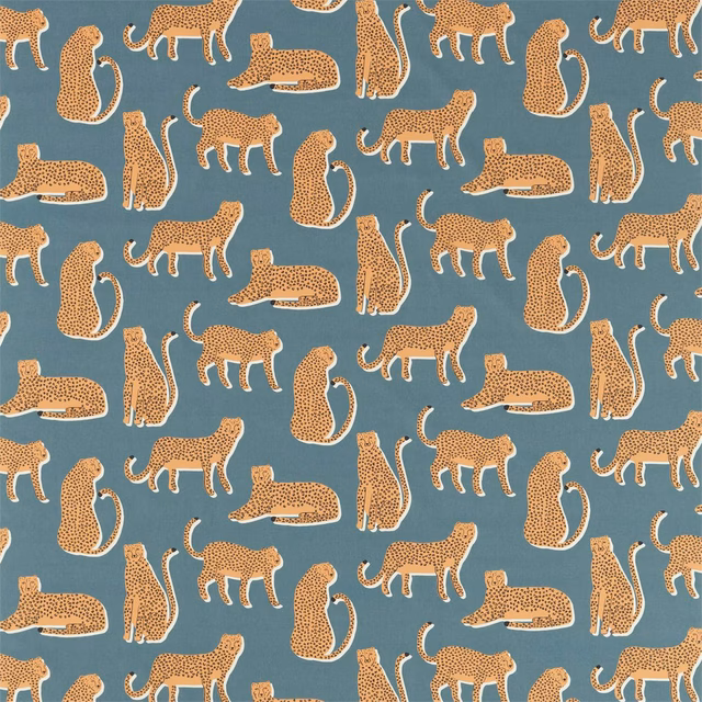 Muted denim-blue fabric with repeating ochre spotted cats and lounging big cats