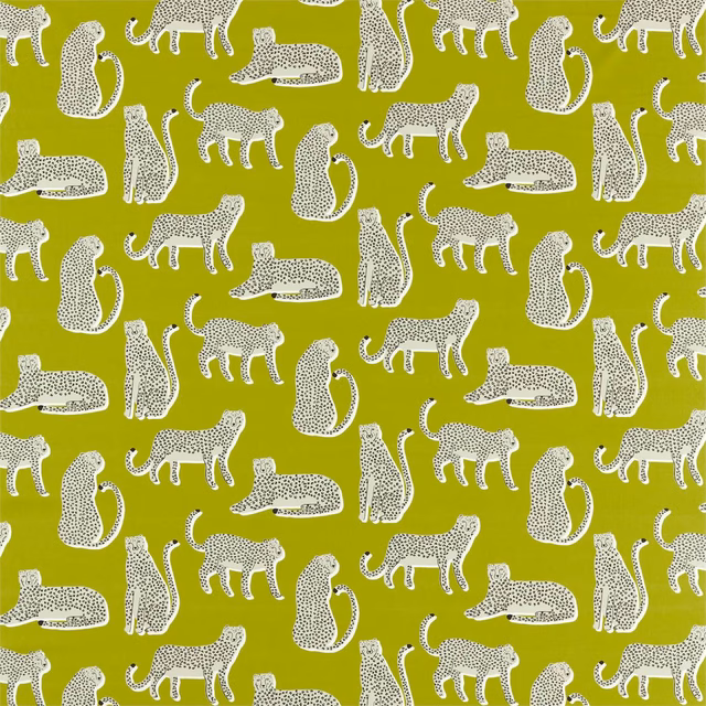 Vivid chartreuse fabric with stippled white and grey lounging and walking cats