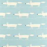 Pale aqua fabric with repeated ivory foxes, black noses and upright ears