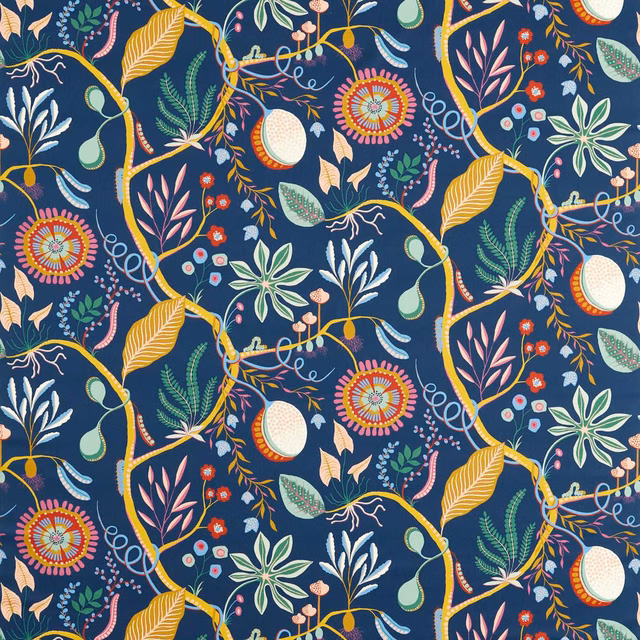 Midnight blue botanical textile with mustard vines, pink blooms and pale fruit motifs