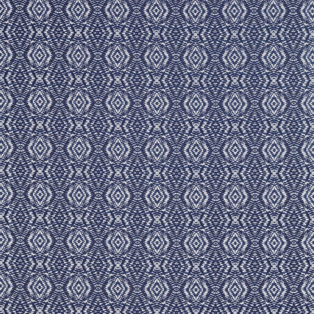 Deep ink-blue woven fabric with tightly repeated pale diamond motifs and fine texture