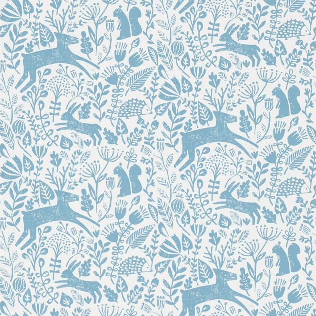 Pale cobalt woodland animals and botanical silhouettes on an airy blue-white ground