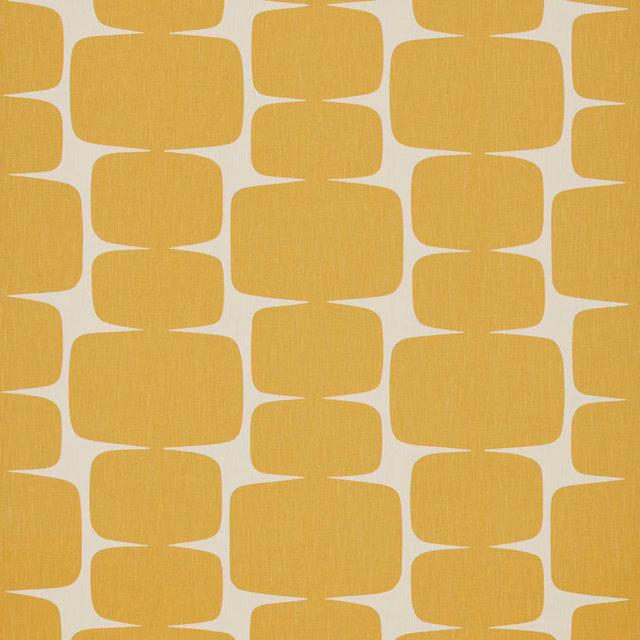 Warm honey rounded blocks in a paper grid with fine woven texture