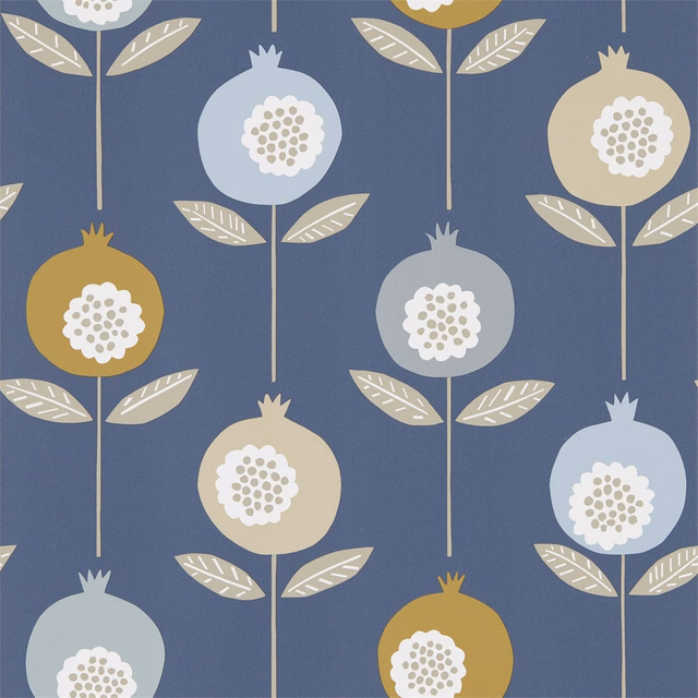 Ink-blue wallpaper with pale blue, cinnamon-gold pomegranates and cream veined leaves