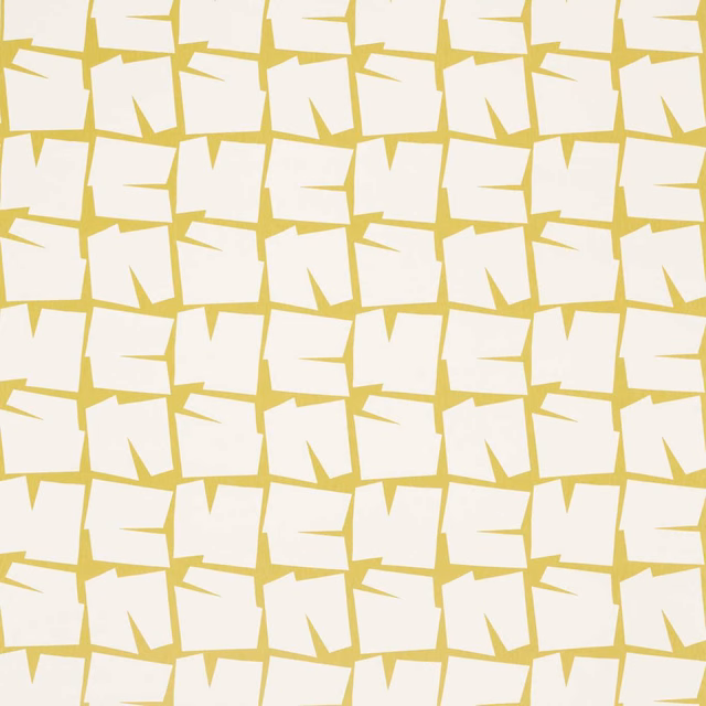Warm citrus yellow fabric with irregular warm-white geometric blocks in repeat