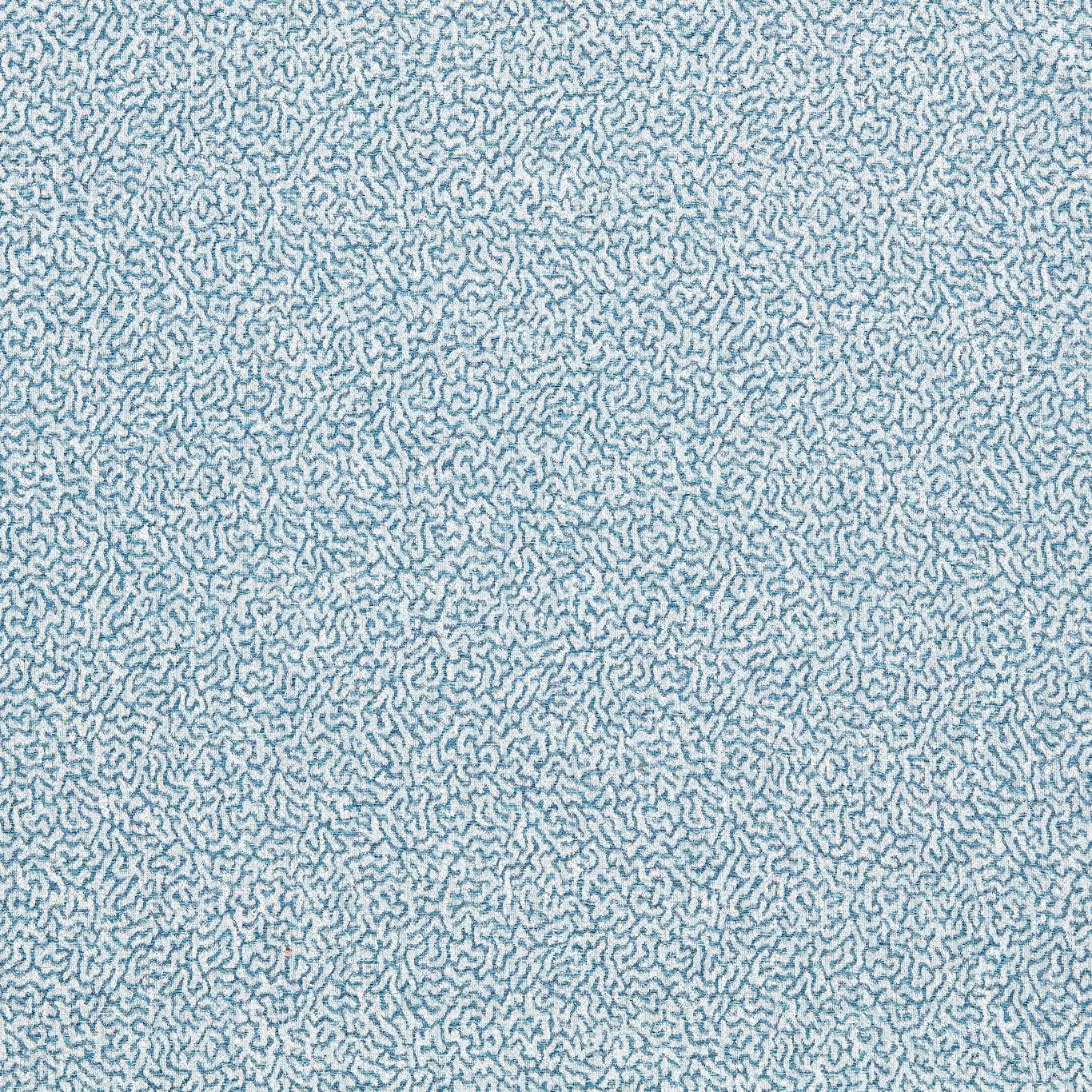 Close-up of Coast Blue fabric with fine blue squiggles on a pale ground