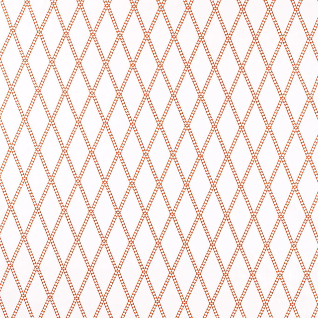 Warm tomato-red embroidered diamond lattice on a crisp white fabric ground
