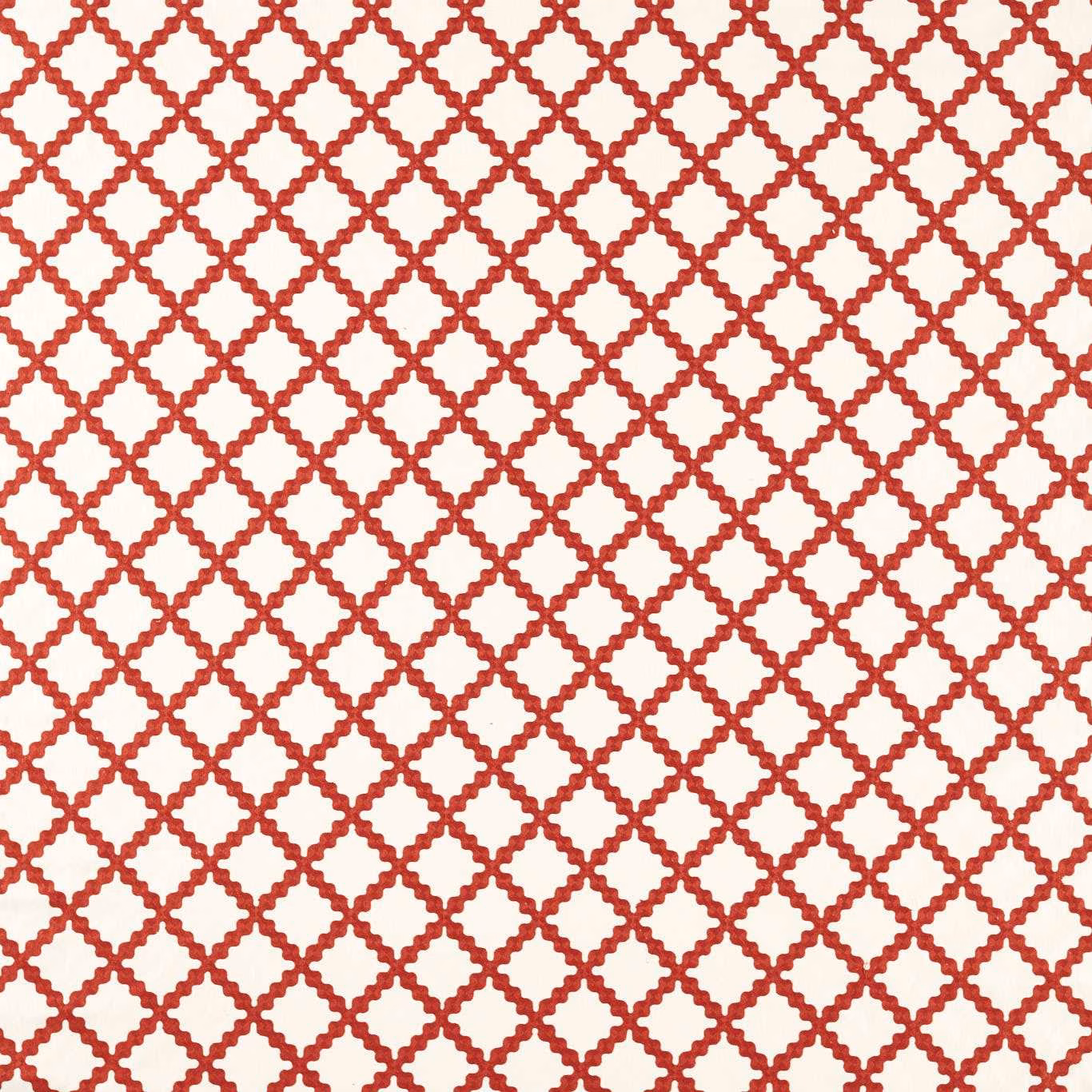 Warm red embroidered lattice on a cream ground, close-up textile texture