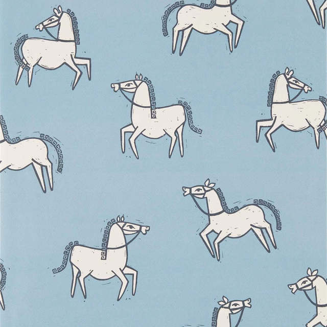 Muted denim-blue wallpaper with ivory horses and patterned charcoal manes