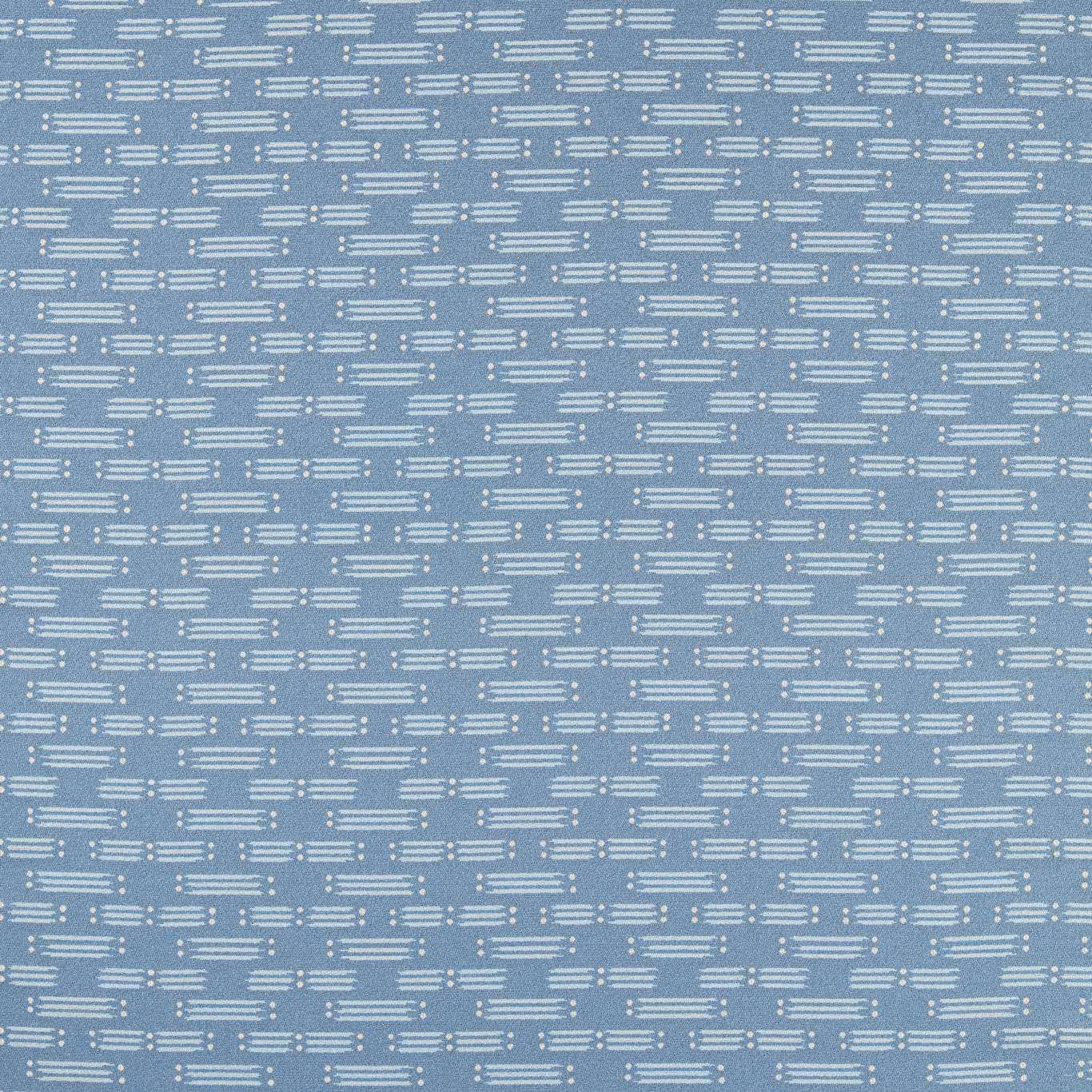 Cool denim-blue woven fabric with ivory horizontal matchstick dashes and textured surface