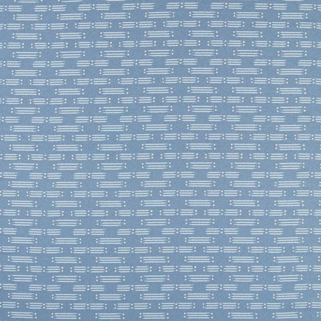 Cool denim-blue woven fabric with ivory horizontal matchstick dashes and textured surface