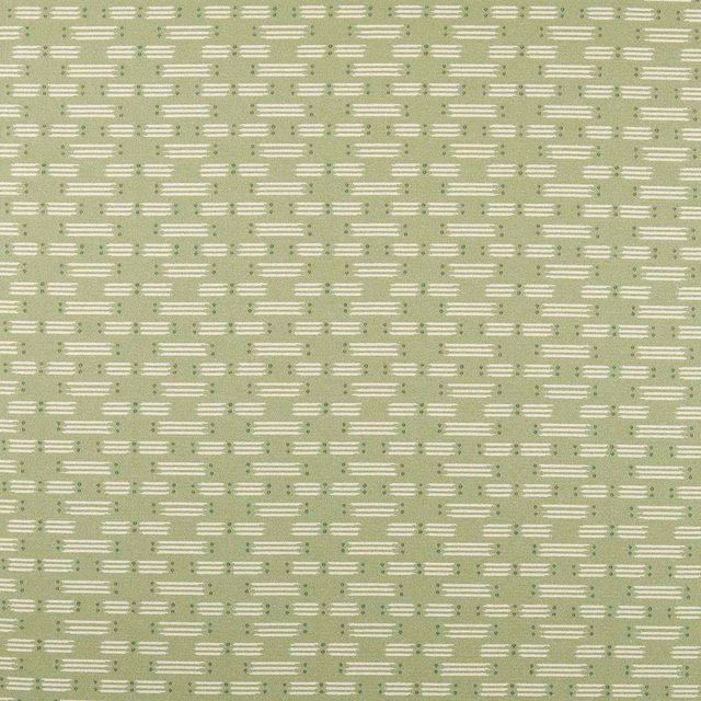 Muted pine-green weave with cream matchstick bars and tiny dotted accents