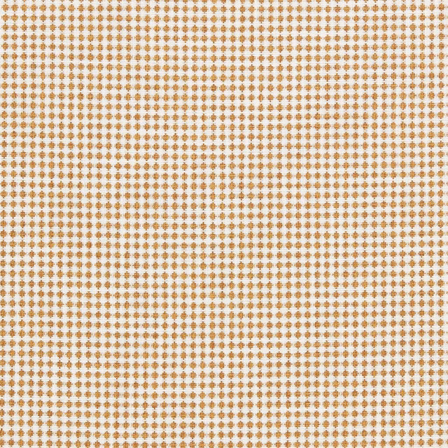 Warm barley-gold geometric flecks over a cream woven upholstery fabric